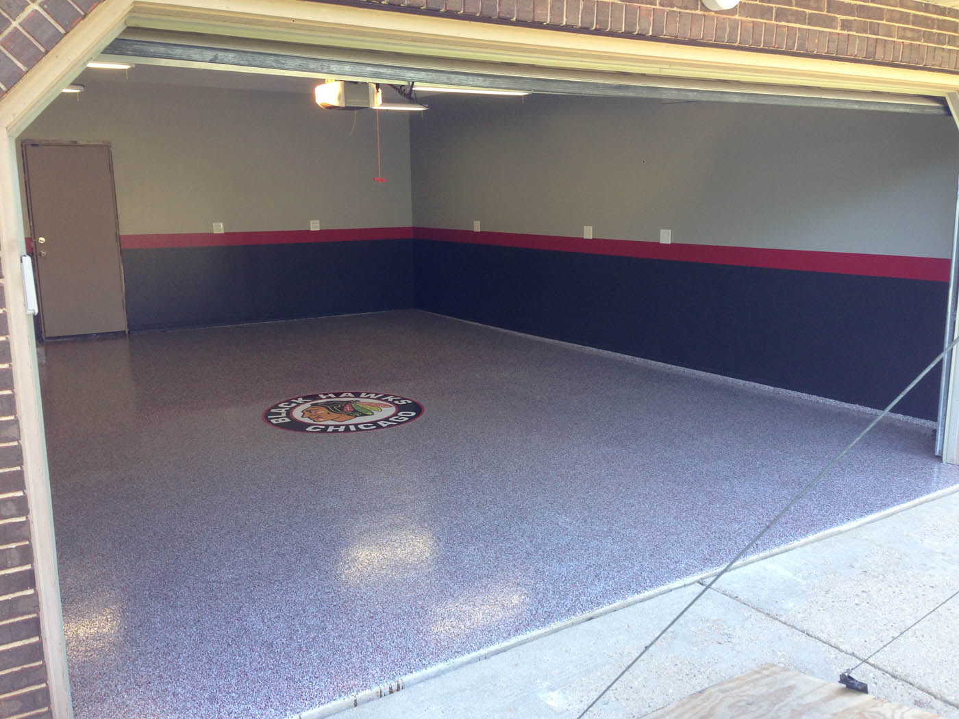 Blackhawks Garage ---residential-garage-custom-concrete-flooring-solutions-matrix-coating-west-chicago-illinois